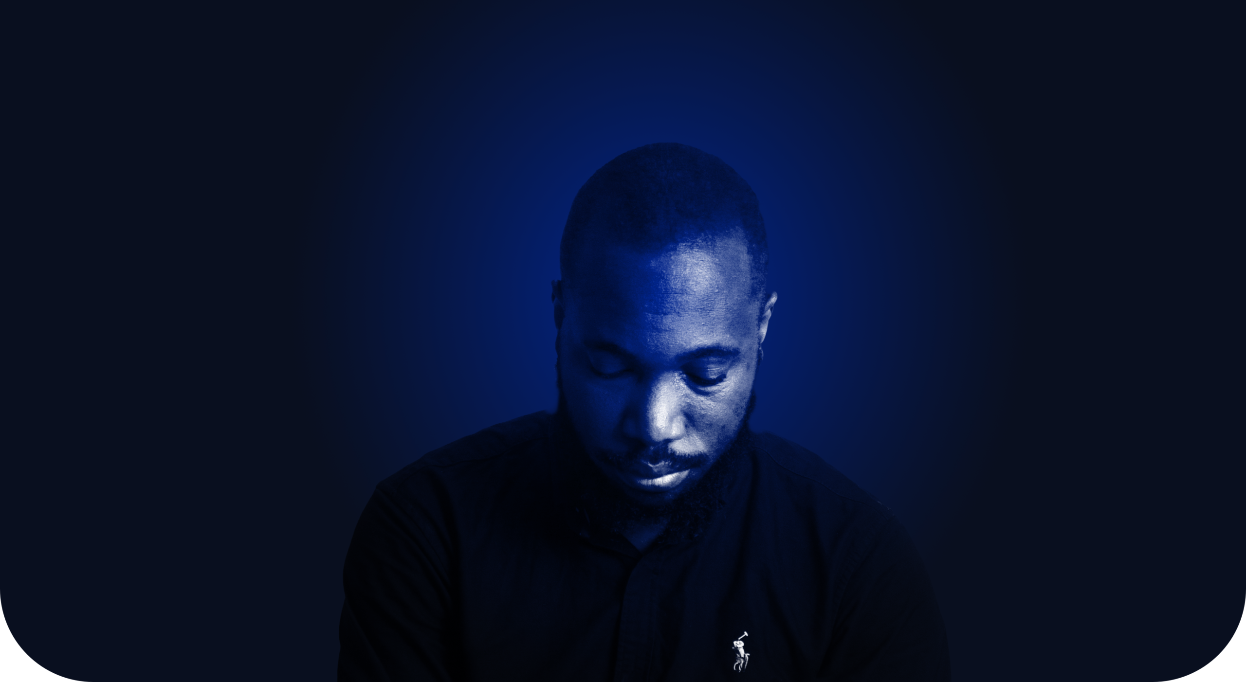 Portrait of Ernest Adzesu in blue light